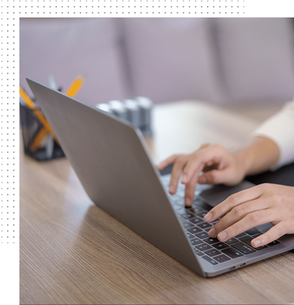 Copywriting concept. A person is typing on a laptop.